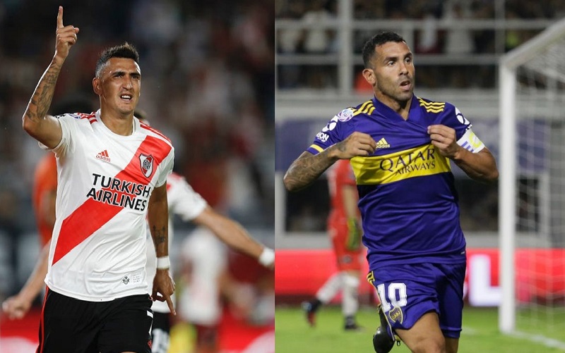 Suárez y Tévez, los goleadores del domingo. 