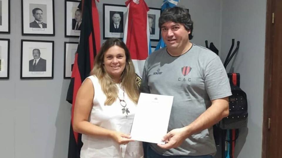 La diputada y el presidente.