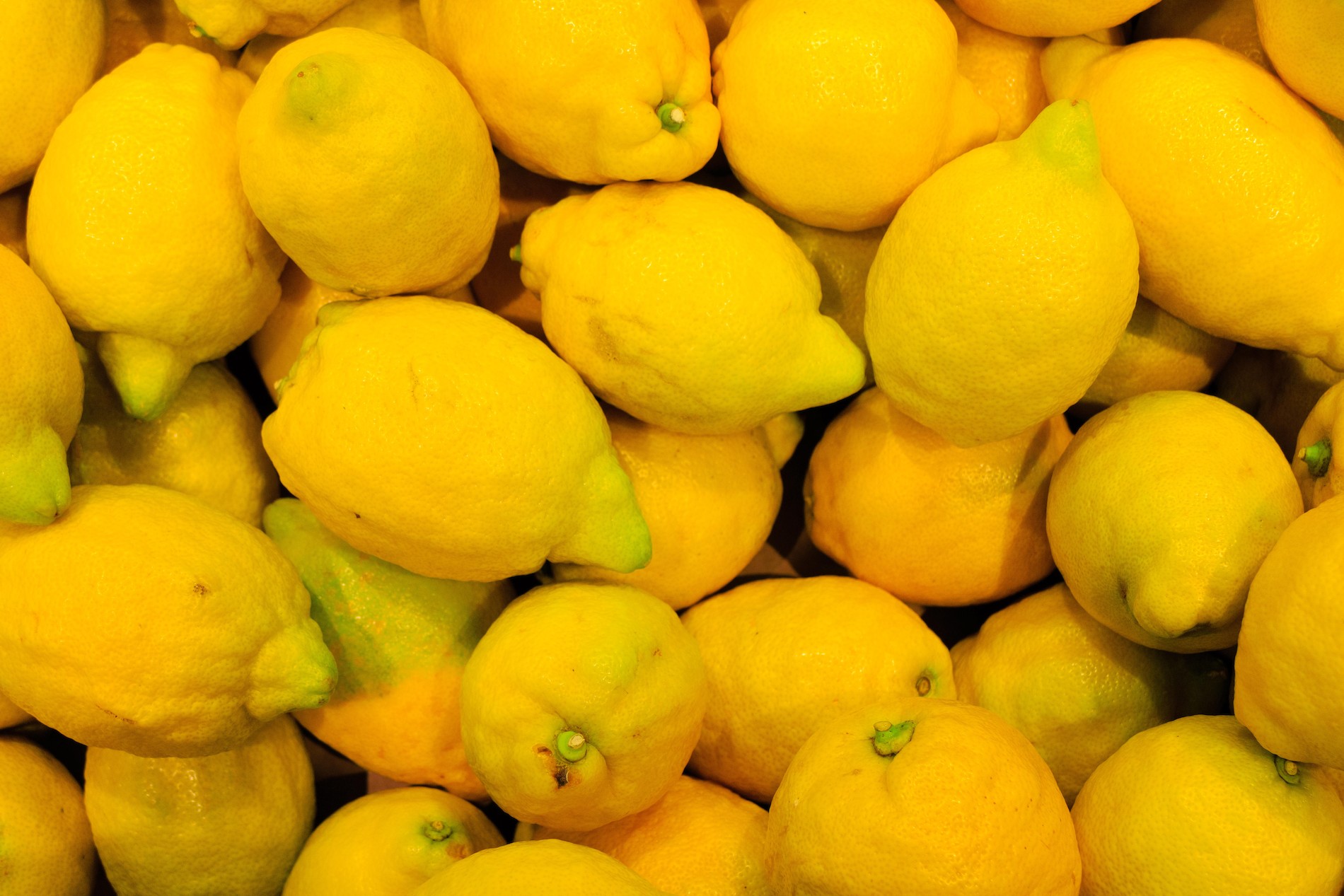 food background. closeup on tropical fruits lemons.. Image shot 07/2014. Exact date unknown.